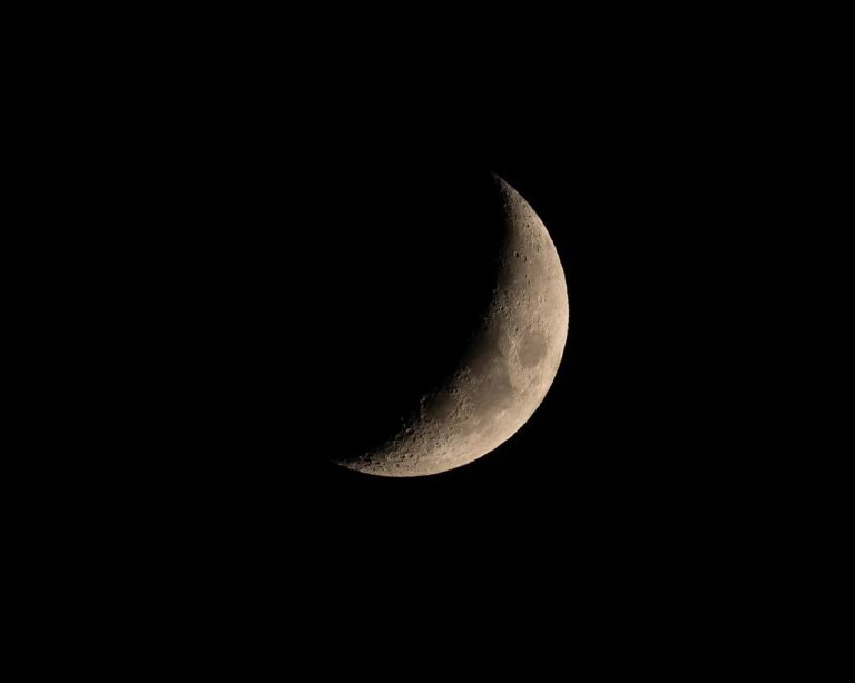 Chandamama and the Missing Slice: A Bedtime Story About Sharing and the Moon 20 Crescent moon glowing in a night sky, from a bedtime story about the moon for kids