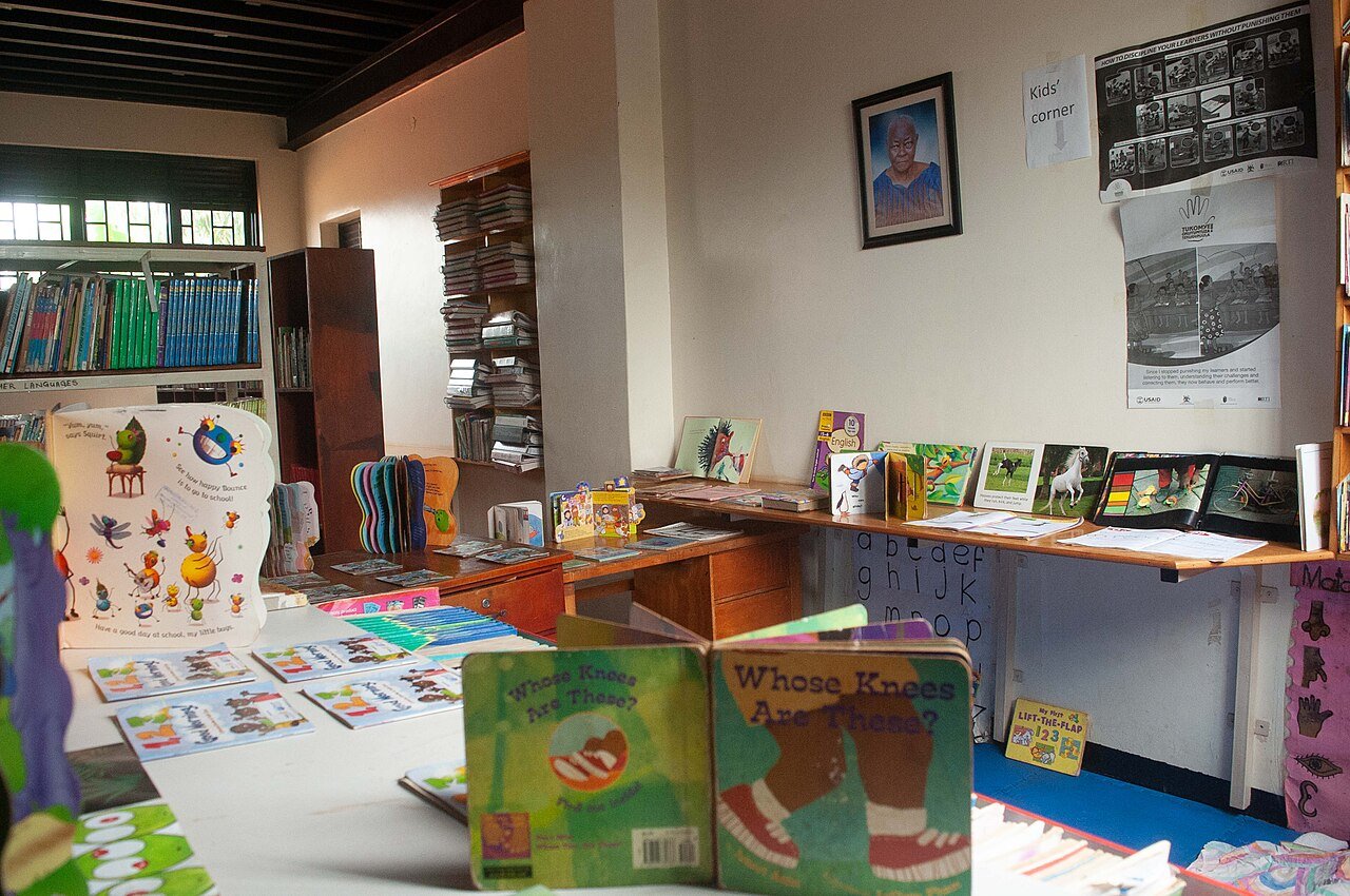 Children reading picture books together to improve English vocabulary for kids