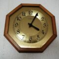 Colourful analogue clock for learning how to teach kids to tell time