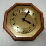 Colourful analogue clock for learning how to teach kids to tell time