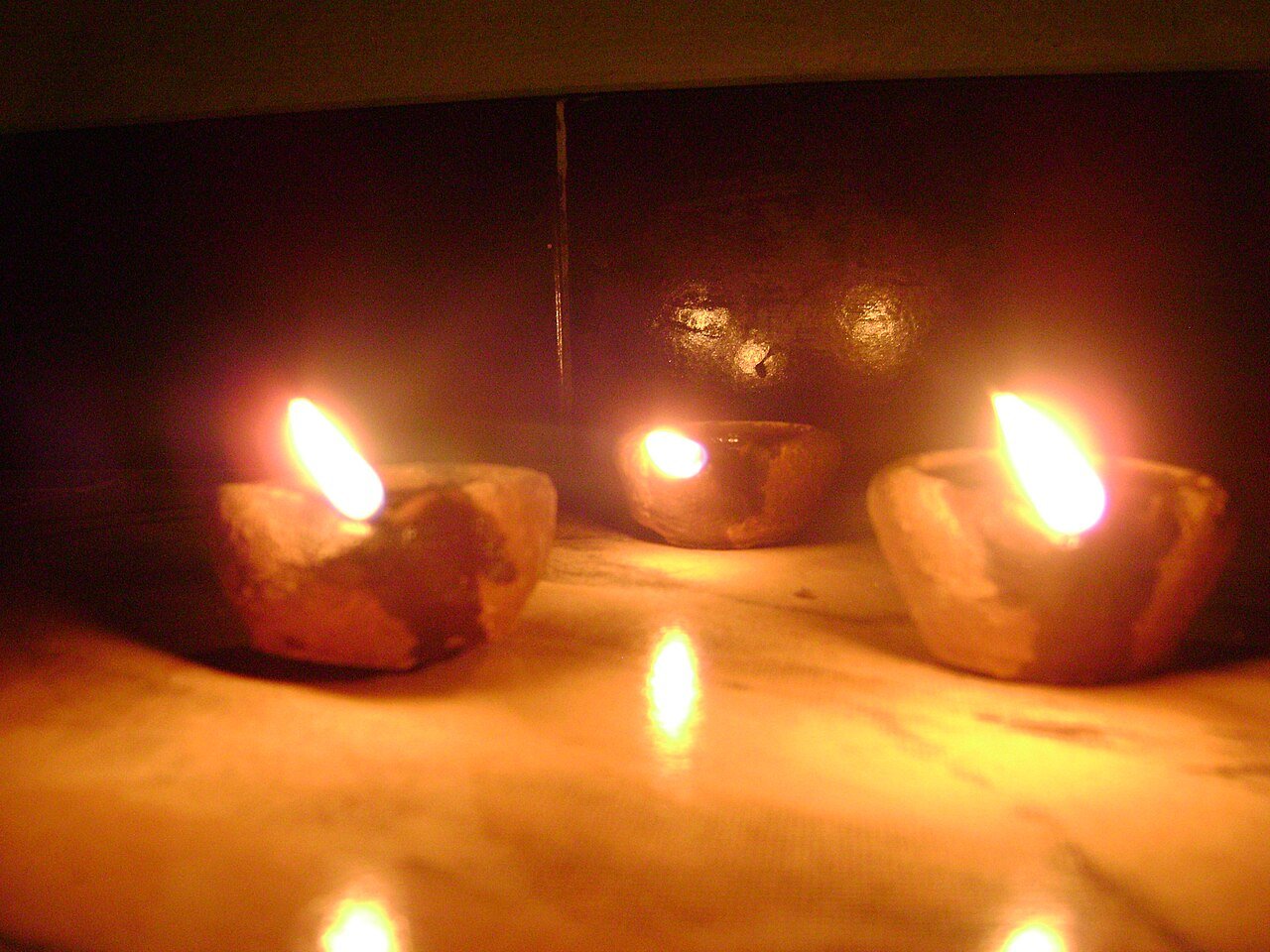 Oil lamps floating and glowing for Karthika Masam traditions