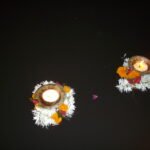 Clay oil lamps glowing during Deepavali, illustrating a perseverance story for kids