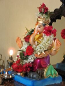 Vinayaka Chavithi Traditions: How Telugu Families Celebrate Ganesh Chaturthi 14 Clay Ganesha idol decorated for Vinayaka Chavithi festival traditions
